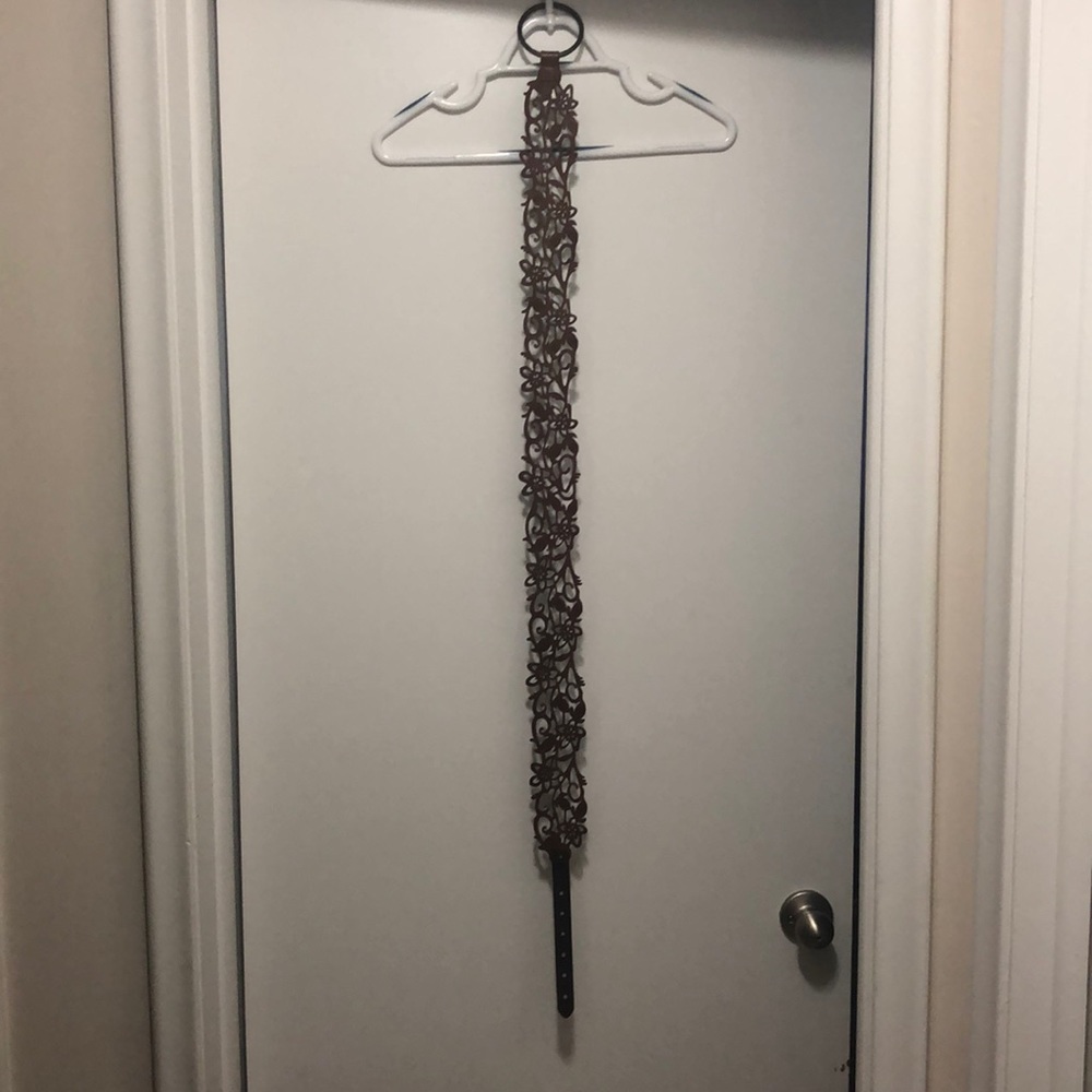 Adjustable faux leather floral belt